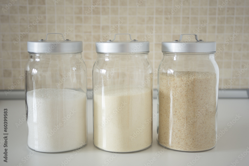 Three containers with flour, breadcrumbs, semolina Three containers with flour, breadcrumbs, semolina