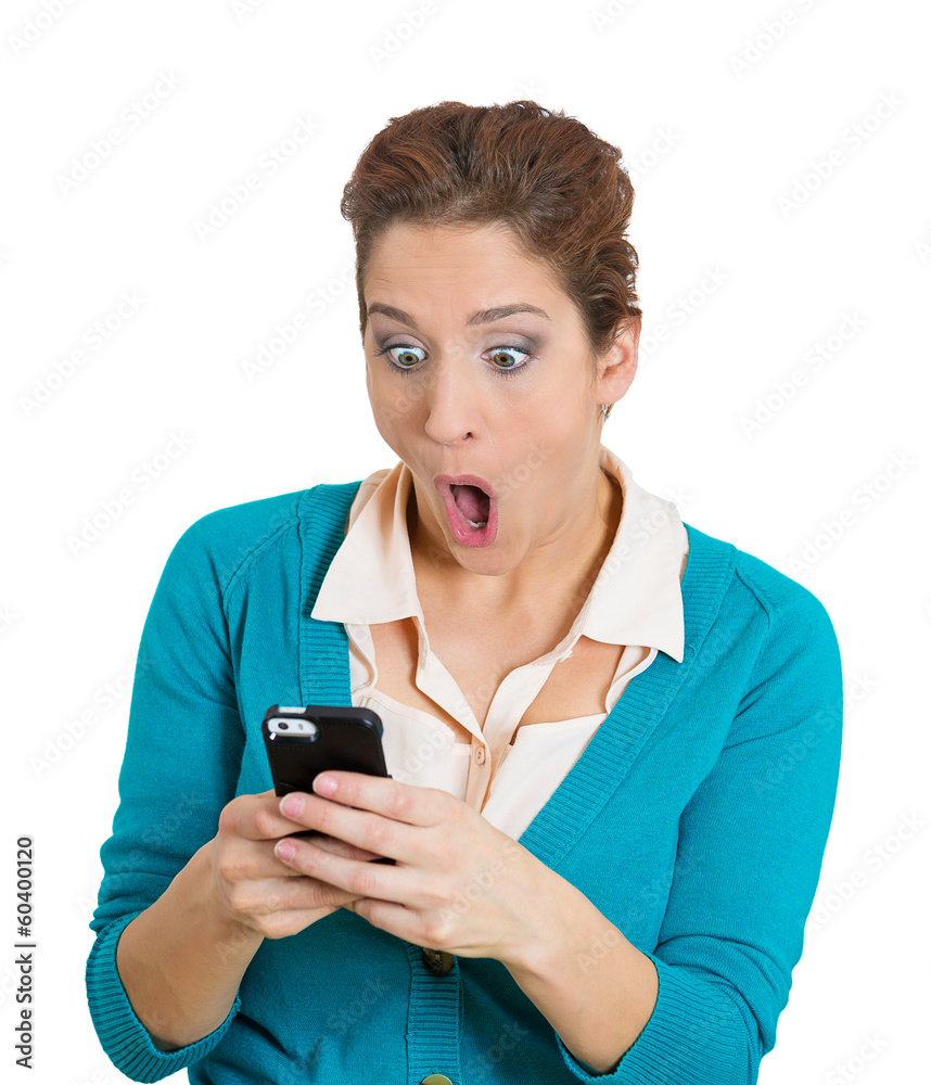 Shocked woman holding phone, receiving bad news Shocked woman holding phone, receiving bad news