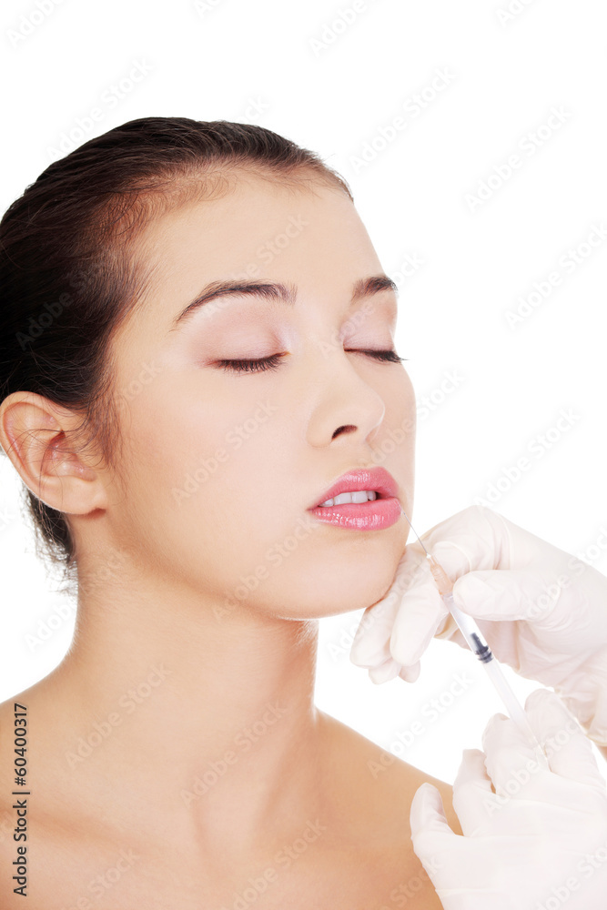 Fototapeta premium Cosmetic botox injection in the female face