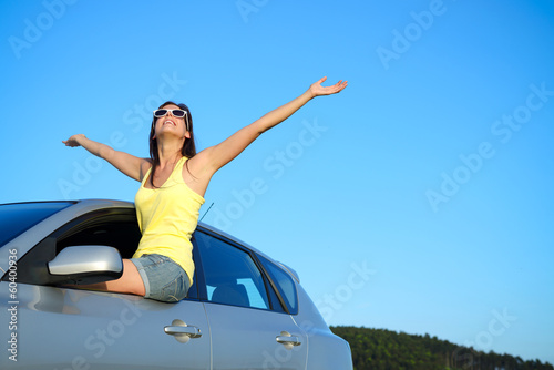 Happy car driver on roadtrip