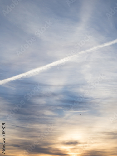 trace of a cloud from an airplane in the sky in the morning © schankz