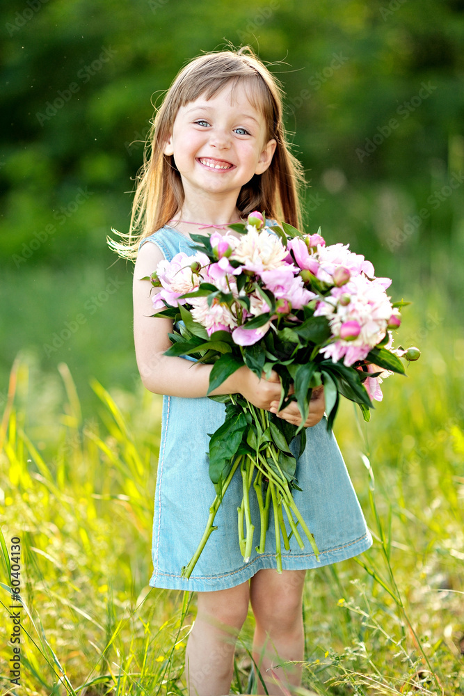 Fototapeta premium portrait of little girl outdoors in summer