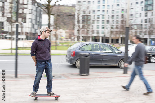 Skateboarder in action on the street.