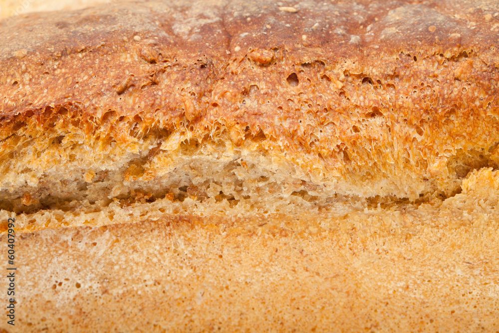 loaves of bread traditionally roasted. Background. Close up. loaves of bread traditionally roasted. Background. Close up.