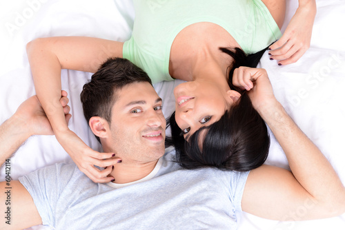 Couple in love in bed