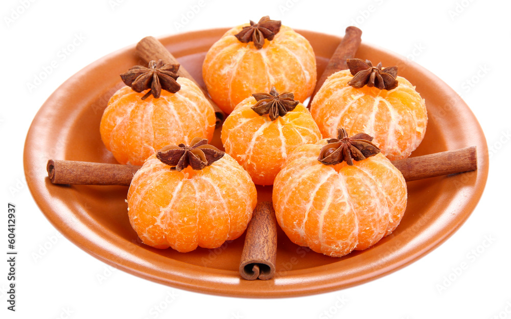 Ripe sweet tangerines and spices, isolated on white Ripe sweet tangerines and spices, isolated on white