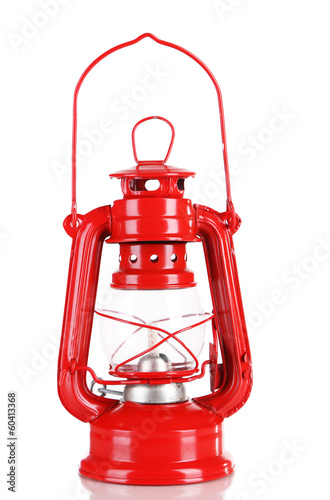Red kerosene lamp isolated on white