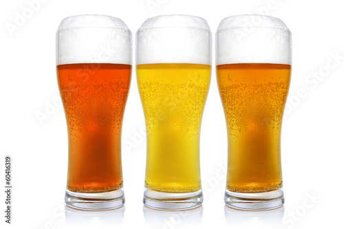 Three glasses with different beers