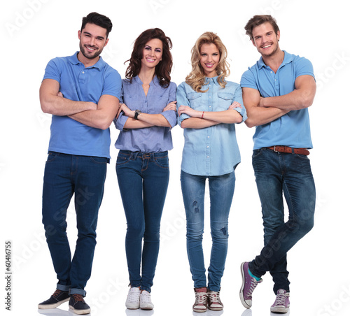 Obraz na plátně full body picture of four casual young smiling people
