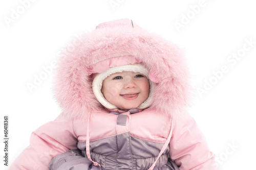 baby sitting on the snow