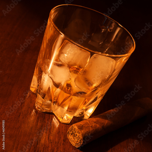 whiskey on ice and cigar photo