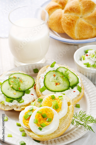 Healthy breakfast. Fresh canapes with egg and cottage cheese.