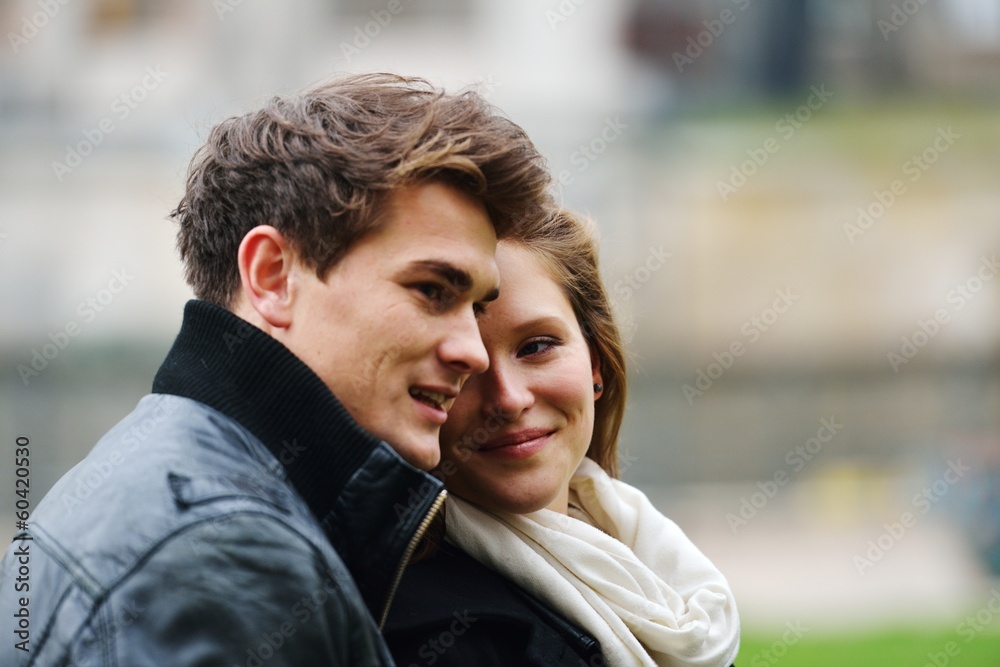Fototapeta premium Lovely couple enjoying fall in love at park
