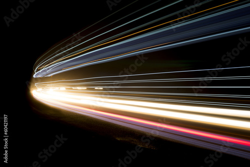 Beautiful and colorful abstract lights in a car tunnel photo