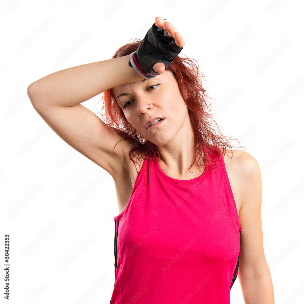Young girl after doing sport over white background Young girl after doing sport over white background