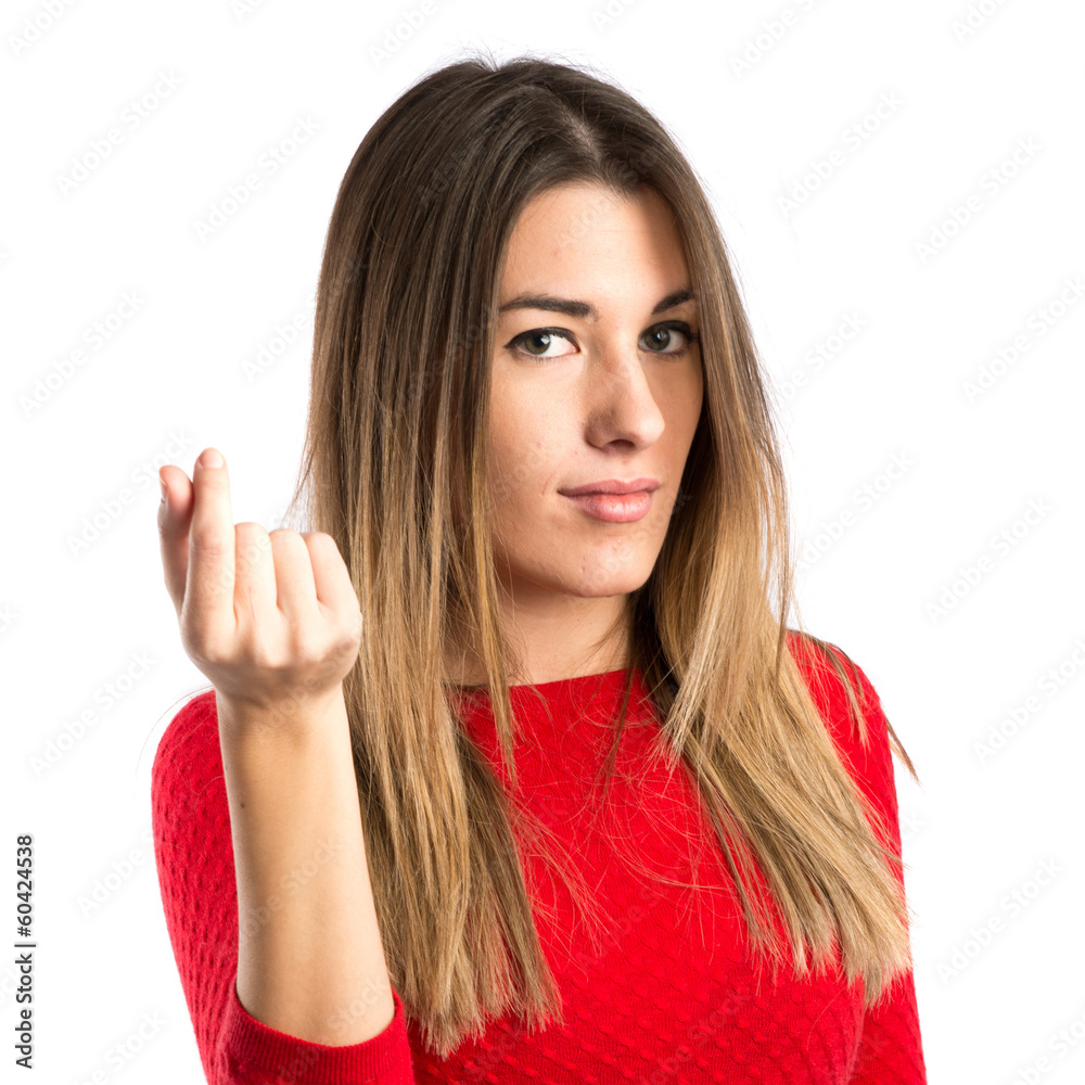 Young girl doing a money gesture over white background Young girl doing a money gesture over white background