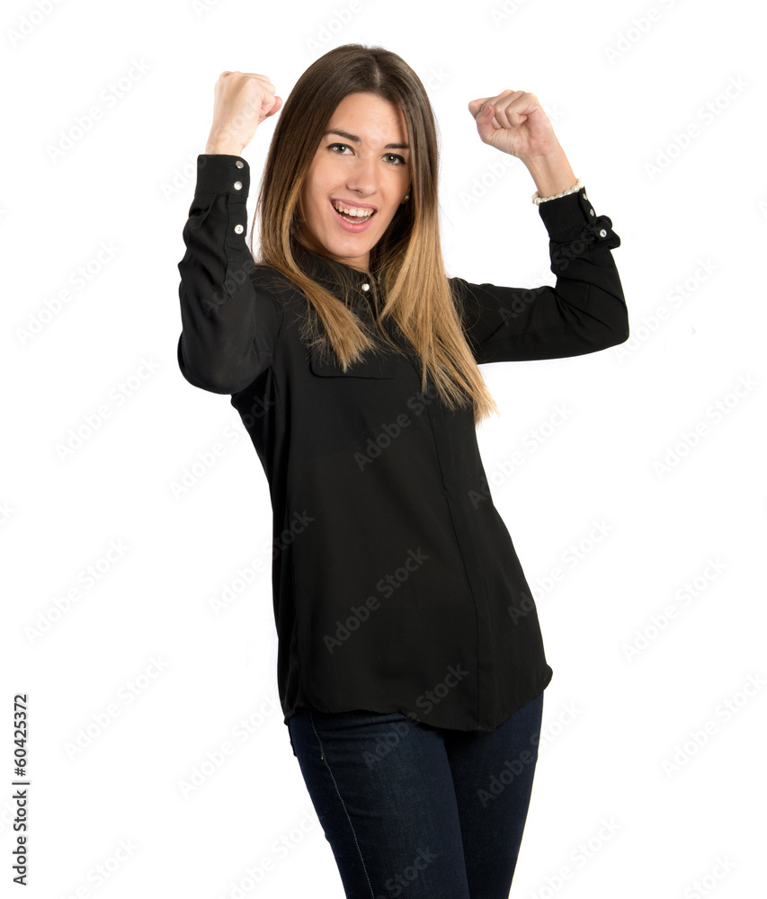 Young girl winner over isolated white background Young girl winner over isolated white background