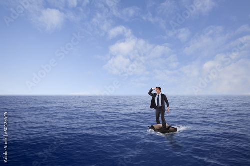 Businessman lost at sea photo