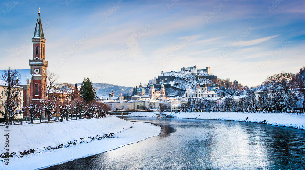 Fototapeta premium Historic city of Salzburg with river Salzach in winter, Austria