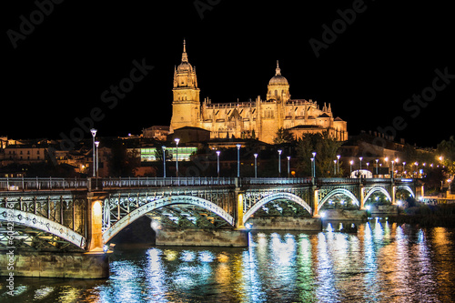 Historic city of Salamanca with river Tormes at night, Spain #60428926