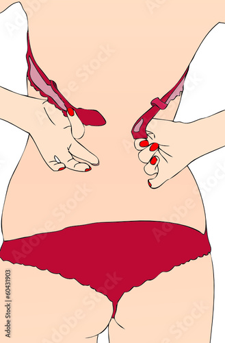 Donna mentre si toglie il suo reggiseno