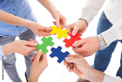 Five People Hand With Puzzle