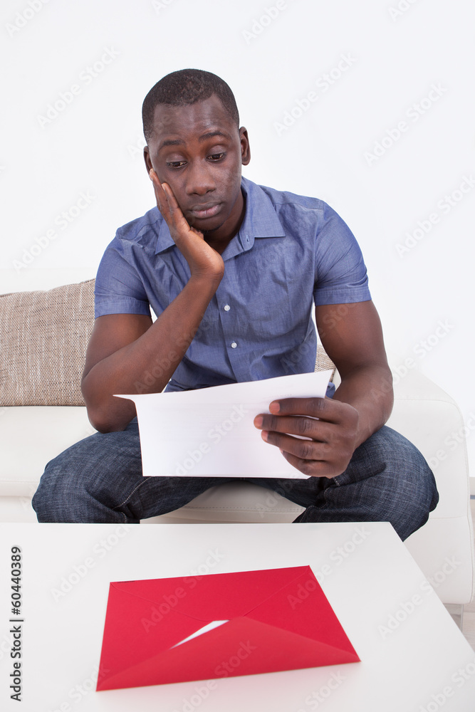 African Man Reading Paper African Man Reading Paper