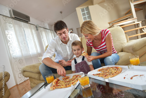 family eating pizza