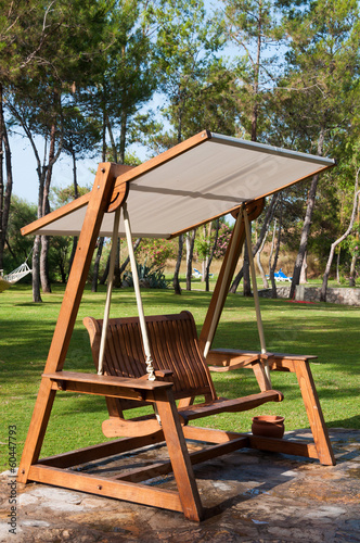 Bench swing with canopy outdoors