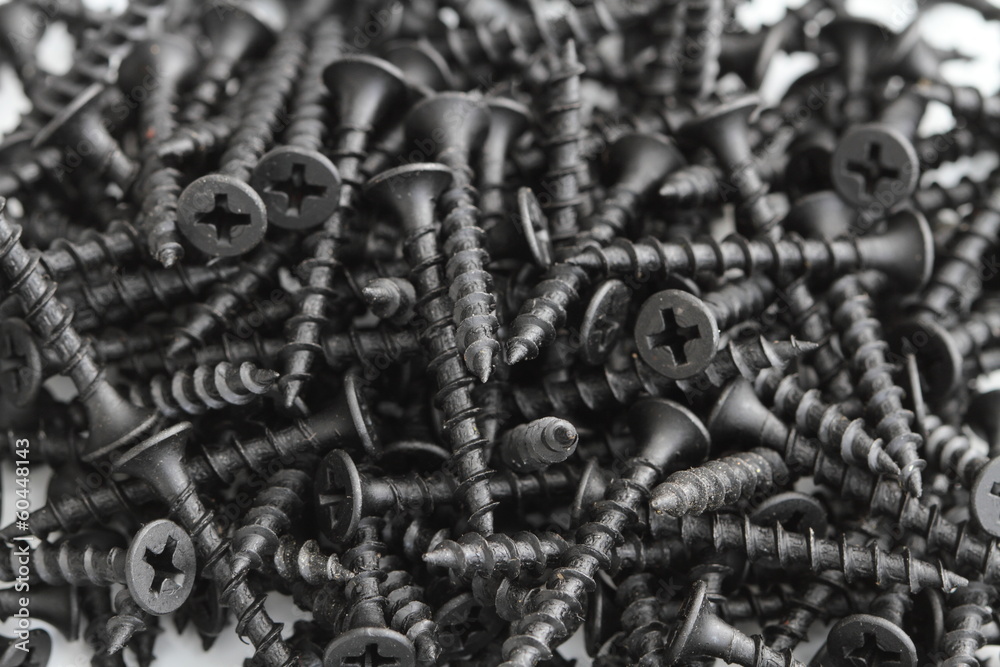 viele schwarze Schrauben StockFoto Adobe Stock