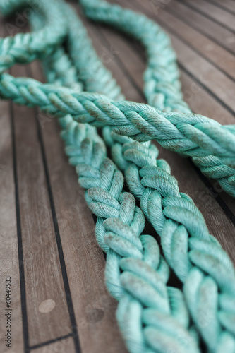 Green rope on ship deck