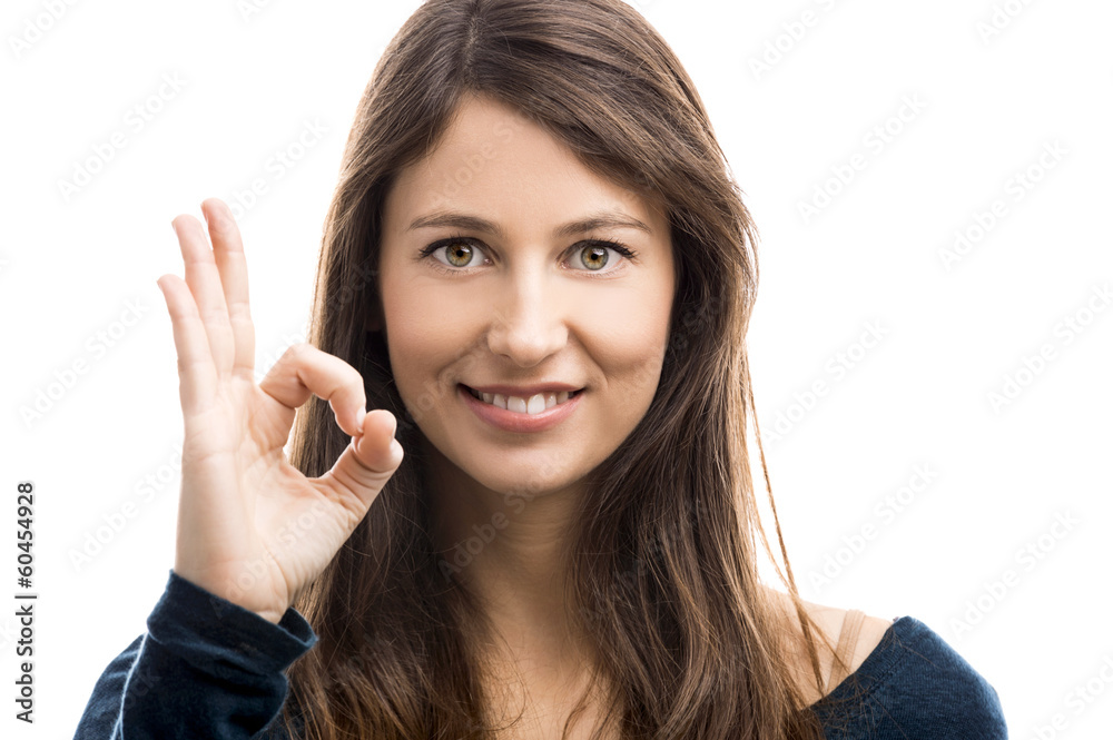 Beautiful woman doing a OK signal with her hand Beautiful woman doing a OK signal with her hand