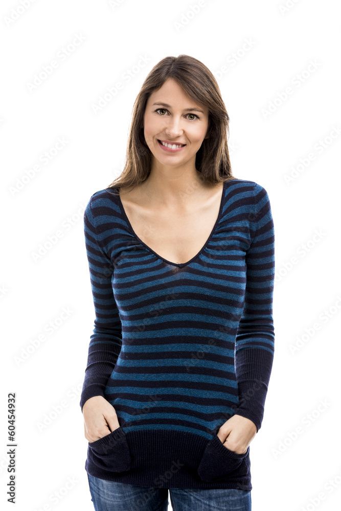 Beautiful woman smiling and standing over a white background