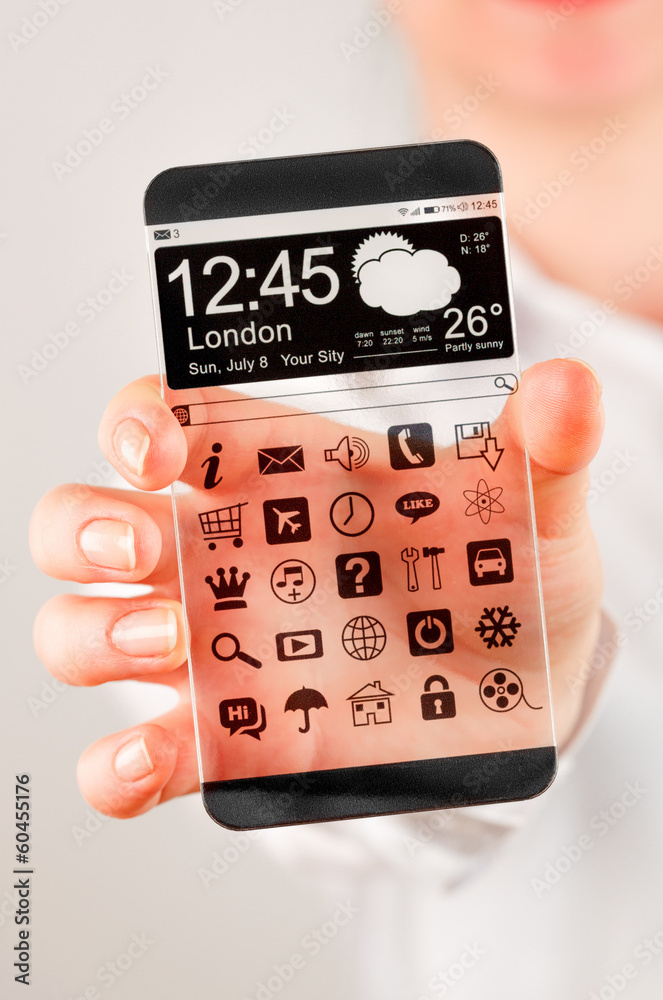 Obraz premium Smartphone with transparent screen in human hands.