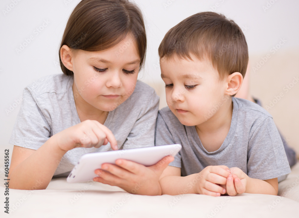 Children using tablet computer Children using tablet computer