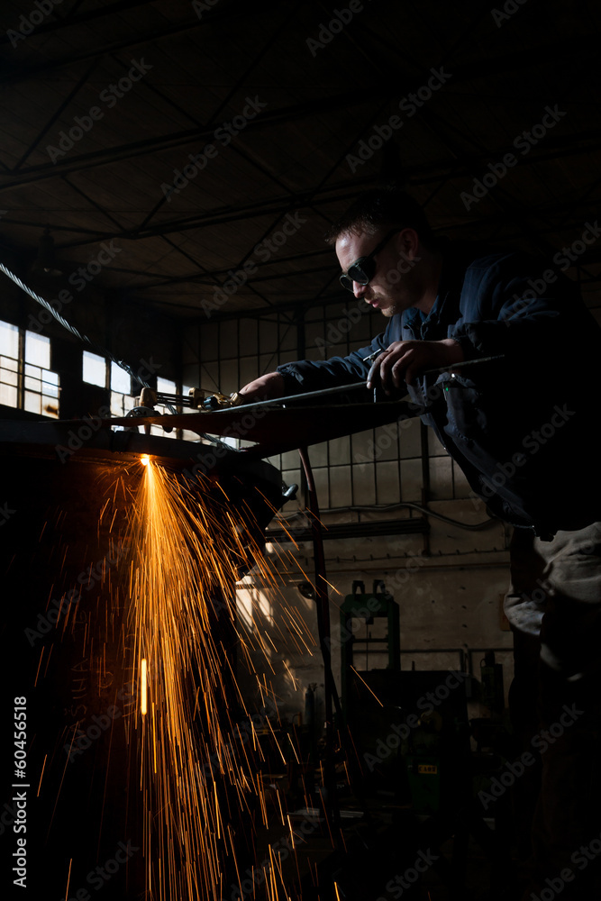Welder working at the factory