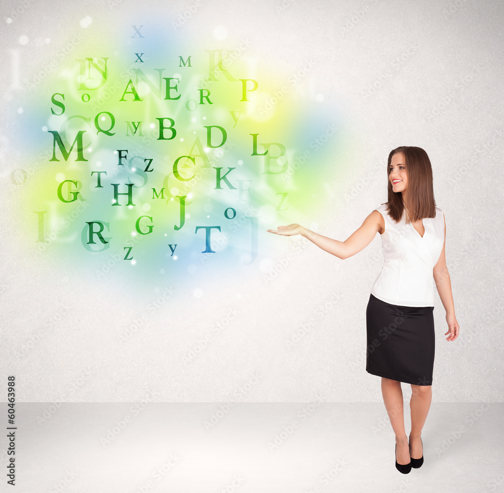 Business women with glowing letter concept Business women with glowing letter concept