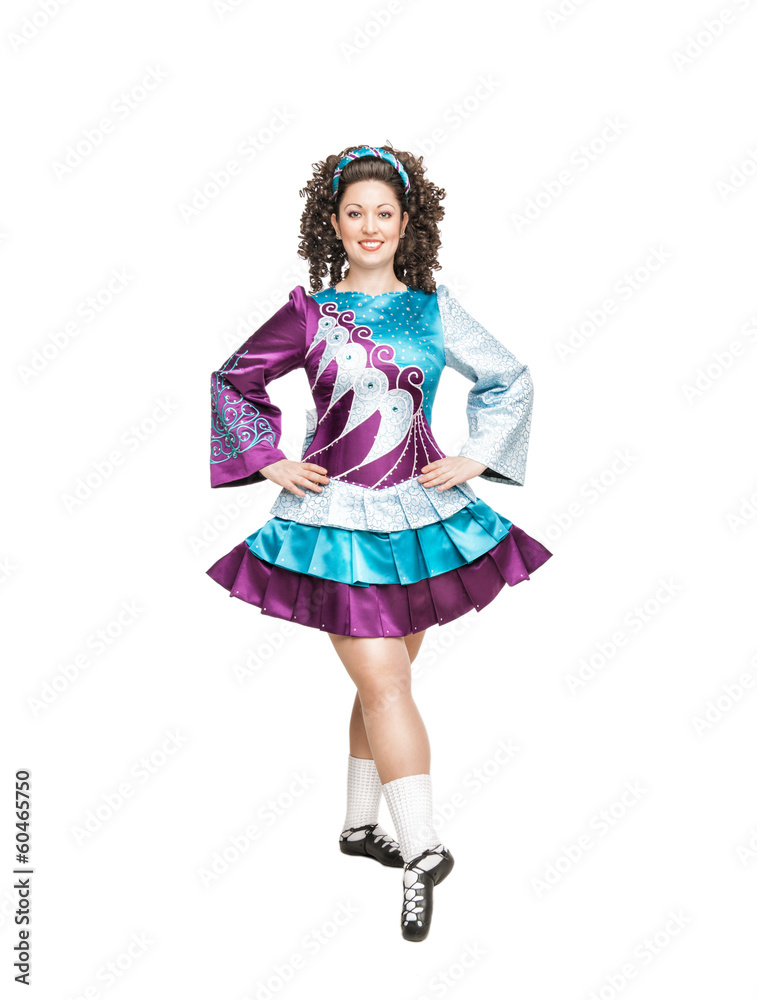 Young woman in irish dance dress posing isolated Young woman in irish dance dress posing isolated