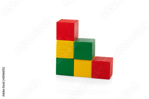 Wooden blocks, pyramid of colorful cubes, childrens toy isolated