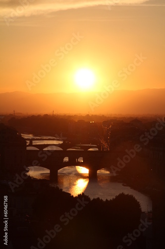 Florence, Italy sunset with bridges and river