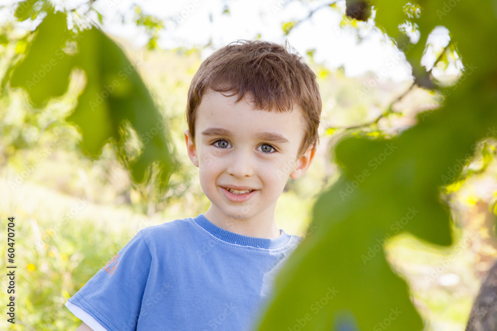 Boy enjoys happiness in the summer sun. Boy enjoys happiness in the summer sun.