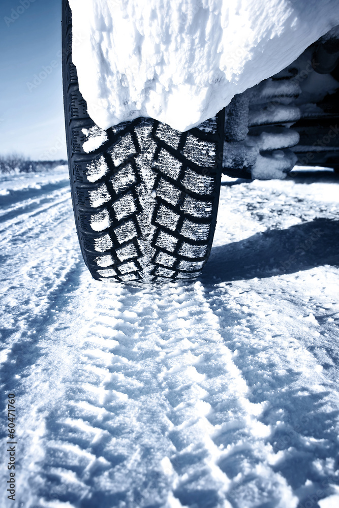 Naklejka premium Closeup of car tires in winter