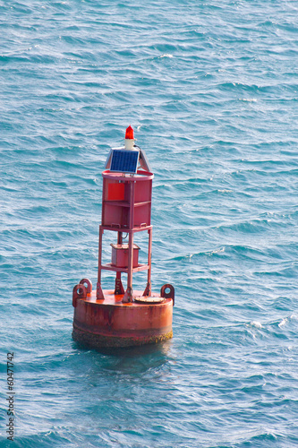 Buoy in Tropical Sea photo