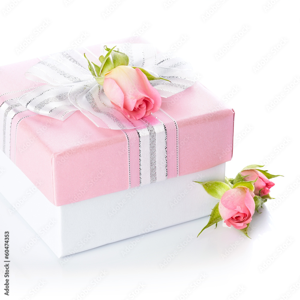 Gift box with a silver bow and roses