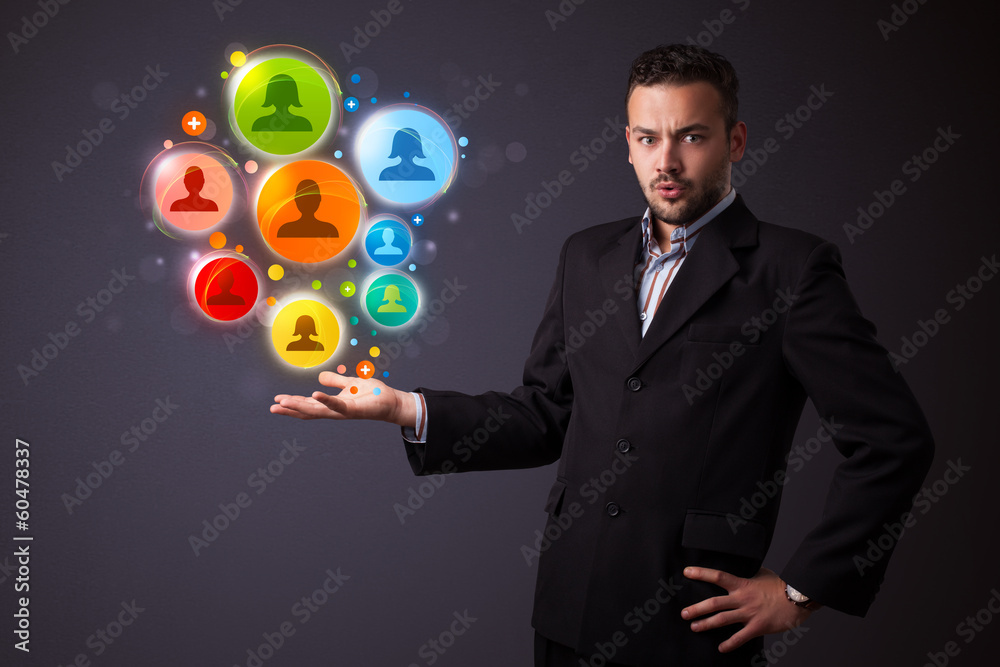 Social network icons in the hand of a businessman