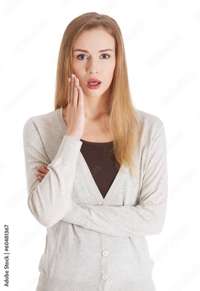 Beautiful casual woman with open mouth, expressing shock. Beautiful casual woman with open mouth, expressing shock.
