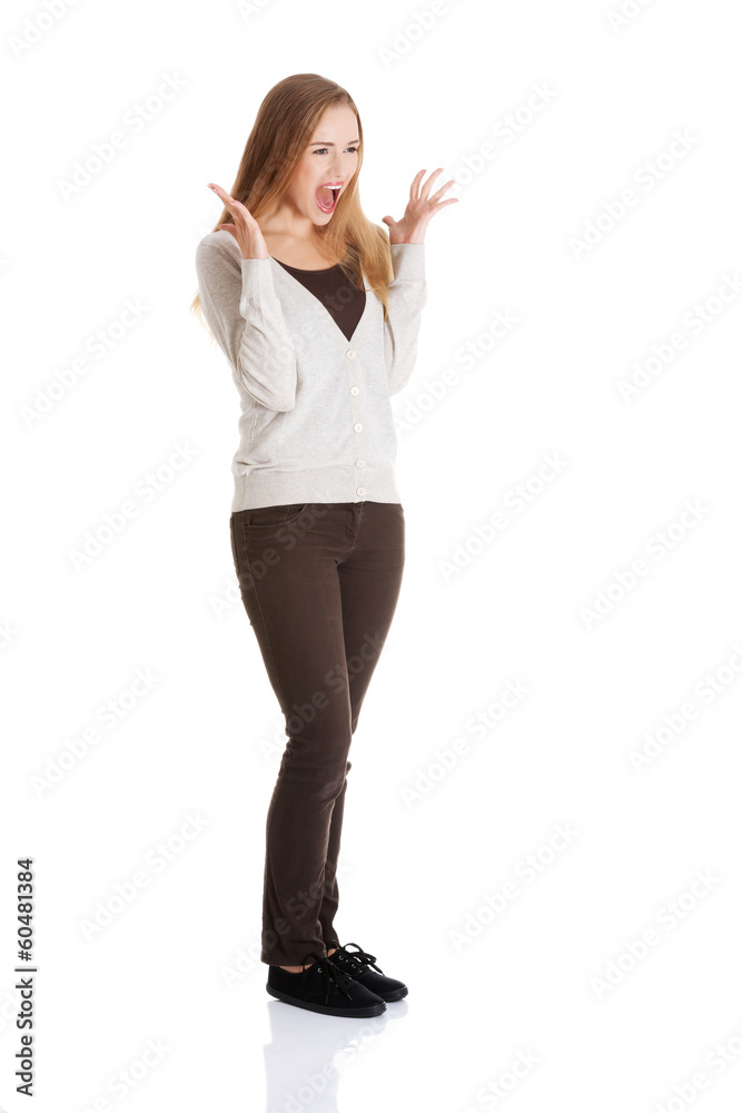 Beautiful positive and casual woman expressing surprise. Beautiful positive and casual woman expressing surprise.