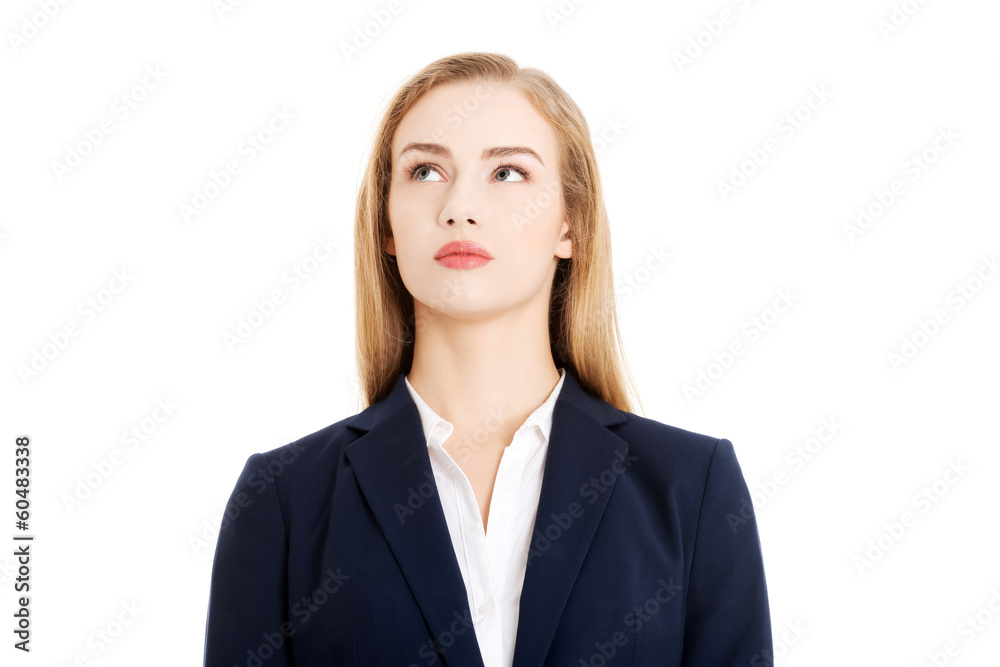 Beautiful business woman looking up at copy space. Beautiful business woman looking up at copy space.