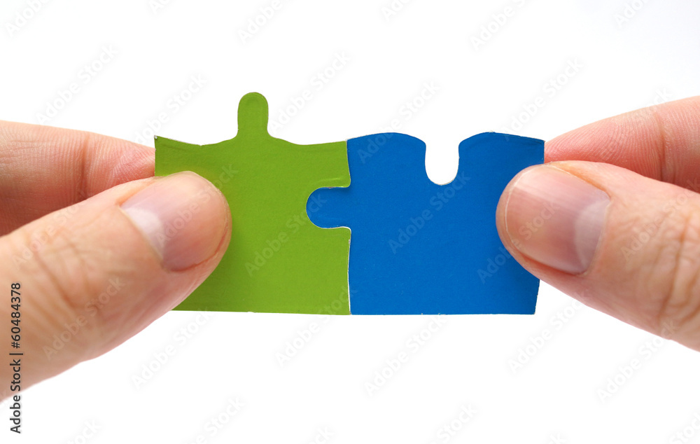 Teamwork and partnership concept with puzzle Teamwork and partnership concept with puzzle