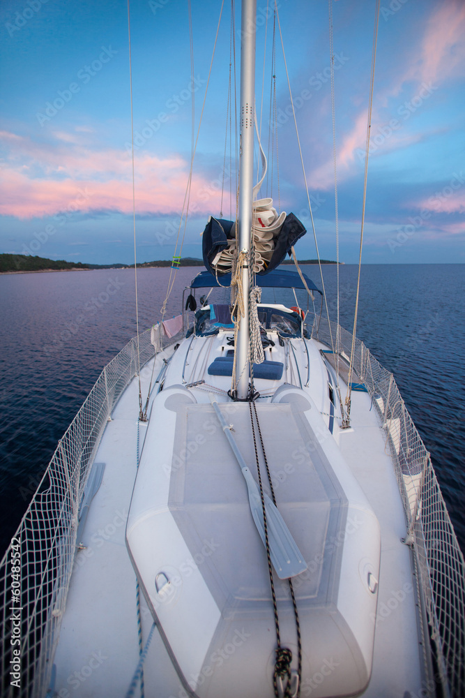 Fototapeta premium Sailboat at sunset